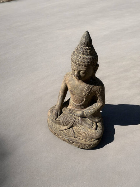 Stone sitting Buddha sculpture from Bali